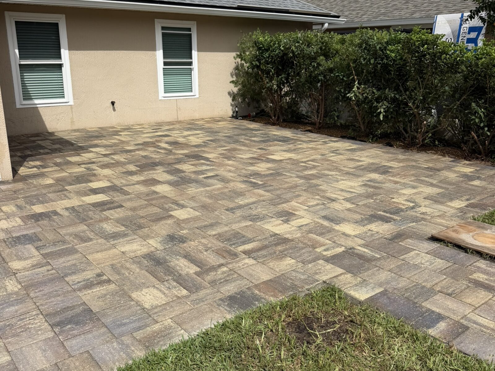 After: Same paver patio after cleaning and sealing